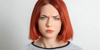 Beautiful woman glancing sideways suspiciously
